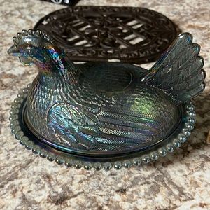 Blue carnival glass nesting hen